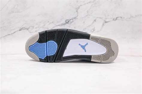 AIR JORDAN 4 RETRO - University Blue • SneakerDouble