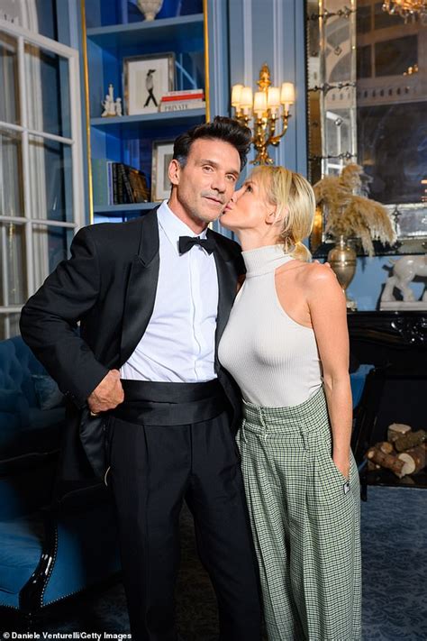 The look of love! Smitten Nicky Whelan cosies up to her Hollywood star boyfriend Frank Grillo in ...