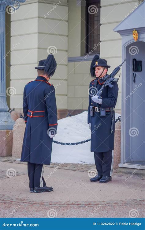 OSLO, NORWAY - MARCH, 26, 2018: Outdoor View of Royal Guards at the Royal Palace, Official ...