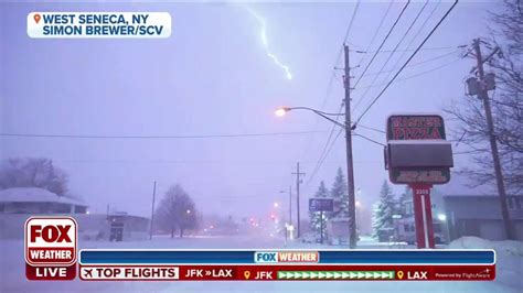 Drone captures incredible views of thundersnow over Buffalo skyline amid historic snowstorm ...