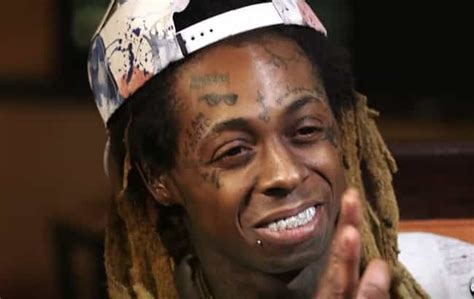 18 Rappers Who Wear Grills