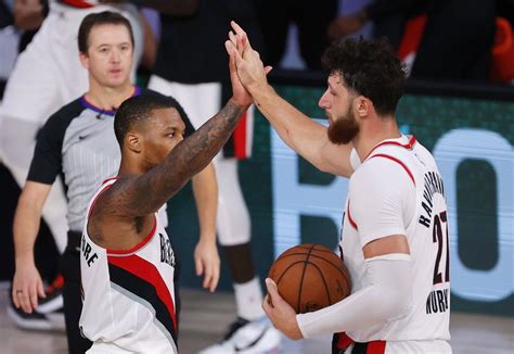 Lillard rebounds with 51, Blazers top Sixers as Embiid hurt | Inquirer ...