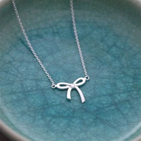 Sterling Silver Bow Necklace By Dizzy | notonthehighstreet.com