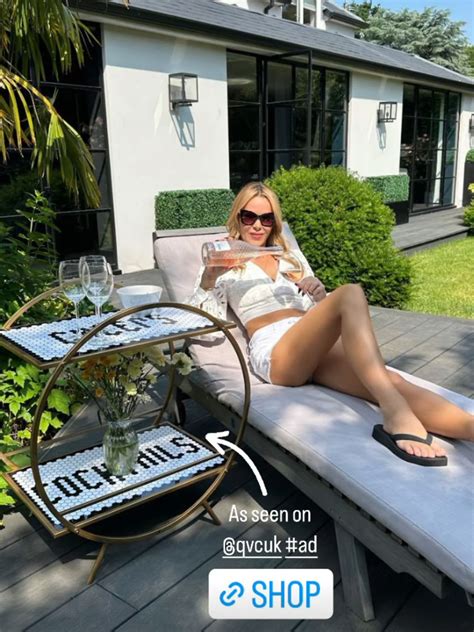 Amanda Holden reveals ultra-luxe garden as she sunbathes in Daisy Dukes and crop top | HELLO!