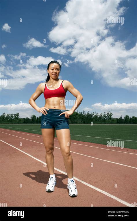 Portrait Of Athlete Standing On A Track Field Stock Photo - Alamy