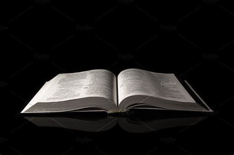 Bible isolated on black background | Black wallpaper, Black backgrounds, Bible