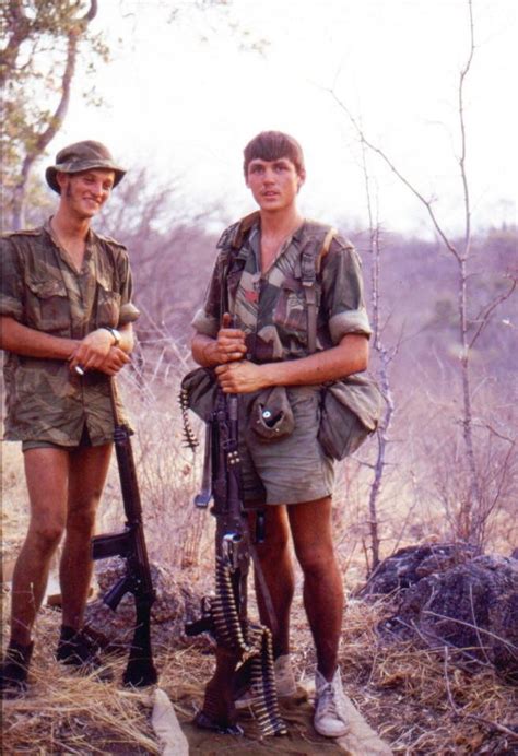 Rhodesian soldiers of the RLI pictured on patrol(The one on the left is armed with either L1A1 ...