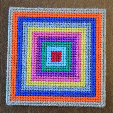 Make this modern coaster with our FREE downloadable plastic canvas pattern, available on o ...