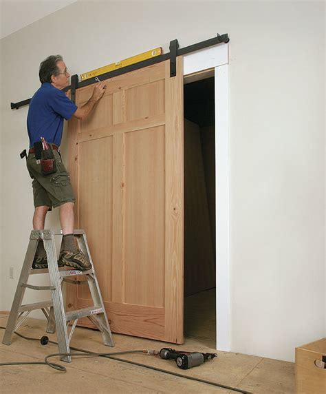 How to Install a Sliding Barn Door - Fine Homebuilding