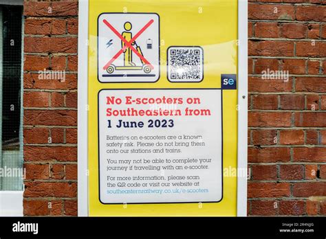 Sign at railway station in Kent announcing a ban on E-scooters from all London & South Eastern ...