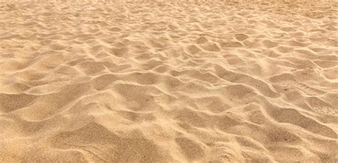 Premium Photo | Sand on the beach as background