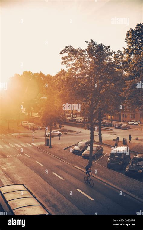 City street at sunset Stock Photo - Alamy