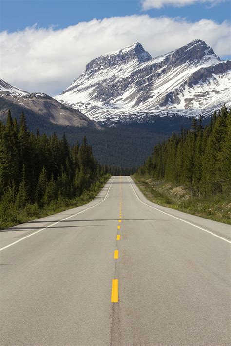 HD wallpaper: straight road between trees, mountain, nature, canada, highway | Wallpaper Flare