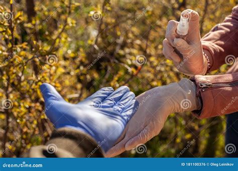 Disinfection of Gloves. Wearing Protective Gloves Stock Photo - Image ...