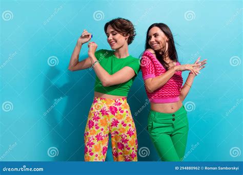 Photo of Excited Funky Girls Dressed Colorful Outfits Dancing ...