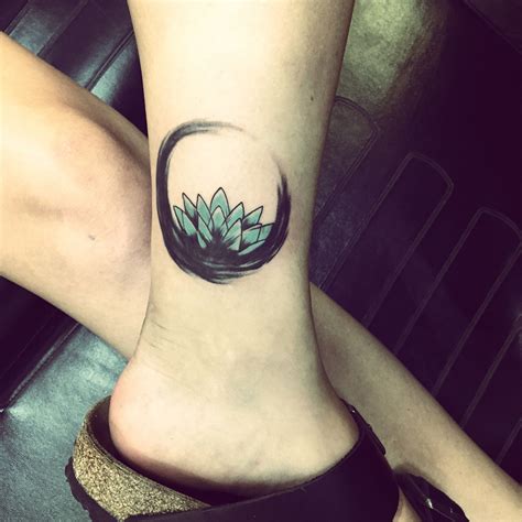 Enzo Circle with Lotus Flower tattoo | Circle tattoos, Cover tattoo, Tattoos