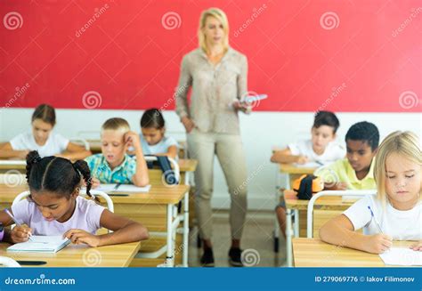 Group of Focused Kids Working at Class Stock Photo - Image of ...