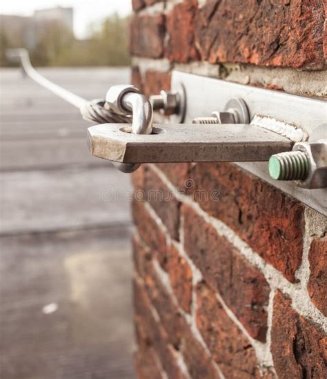 Safety cable on the roof stock image. Image of rope - 116076333