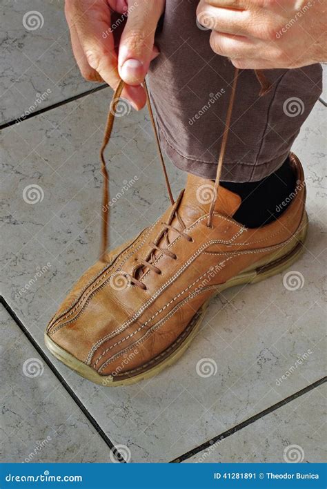 Tying shoes stock image. Image of heel, brown, elegance - 41281891