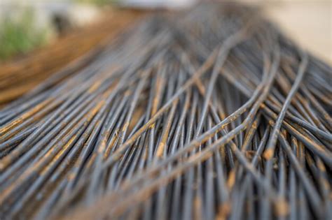 Premium Photo | Stack of steel rebar and metal rust background