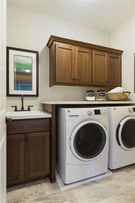 Maximizing Space In The Laundry Room With A Sink Cabinet - Home Cabinets