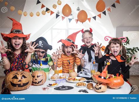 Kids in Halloween party stock photo. Image of cheerful - 137498690