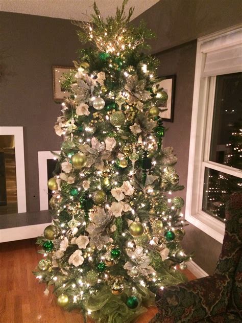 Beautiful green and ivory tree | Green christmas tree decorations, Gold ...