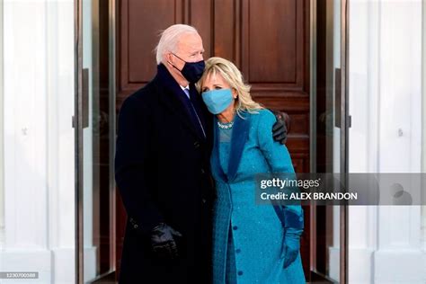 President Joe Biden and US First Lady Jill Biden , hug as they arrive... News Photo - Getty Images