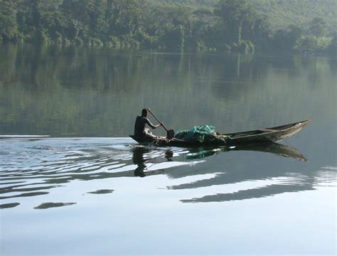 Fisherman on Lake Volta. They go out at dusk and come back at dawn. Lake Volta, West Africa ...