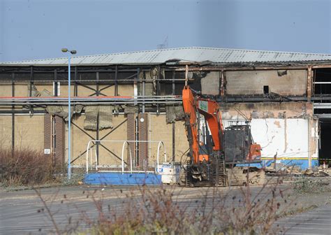 Demolition of former Toys r Us building in Peterborough begins ahead of new Iceland and Home ...