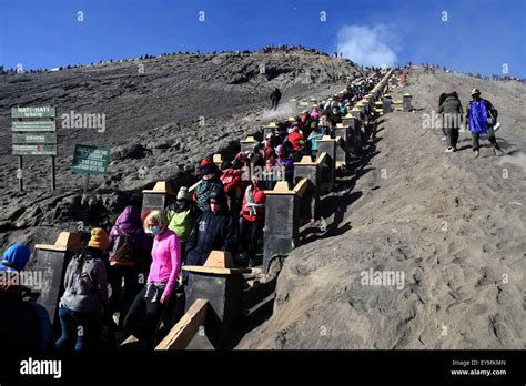 Probolinggo, Indonesia. 1st Aug, 2015. People climb to the peak of Mount Bromo at the ...