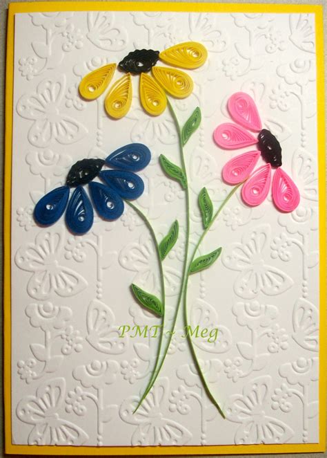 handmade greeting card featuring a trio of simple quilled flowers ... embossing folder texture ...