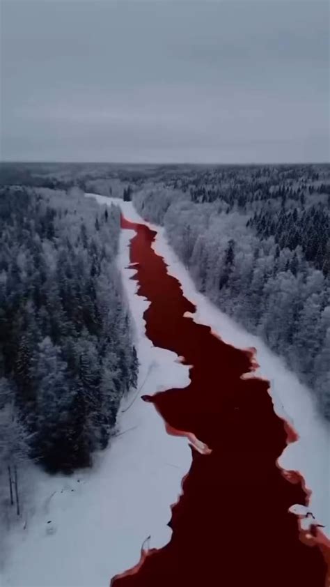 The Iskitimka River in Siberia, turned an errie red after contamination ...