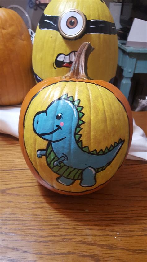 Baby dinosaur Halloween pumpkin for children that I painted | Halloween pumpkin crafts, Dinosaur ...