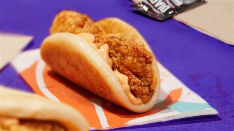 What's In Taco Bell's Crispy Chicken Sandwich Taco? It's An Unexpected & Spicy Mash-Up