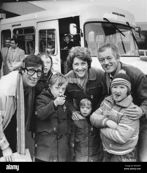 The Shadows s Hank Marvin at the bus handover with l r Neal Armstrong ...