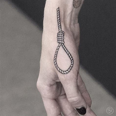 Hangman’s noose tattoo on the hand - Tattoogrid.net