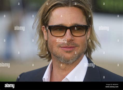 Brad Pitt arrives at the premiere of "Moneyball" at the Paramount ...