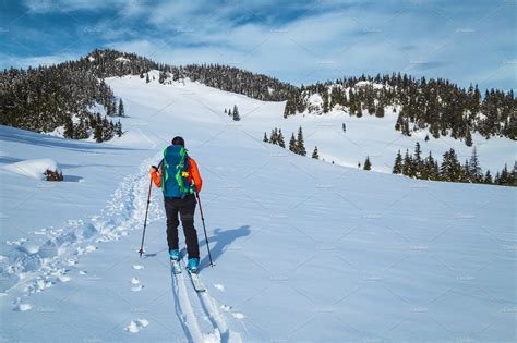 Ski touring on the snowy mountains | Sports & Recreation Stock Photos ...