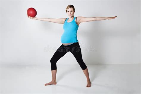 Pregnant Woman Exercising with Exercise Ball Stock Photo - Image of ...