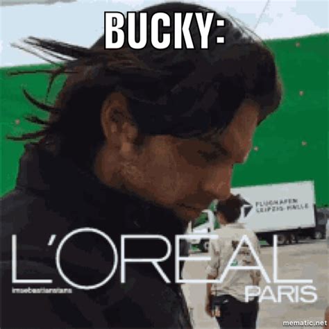 a man with long hair standing in front of a green sign that says, bucky l'oral paris