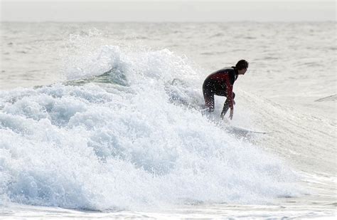 Surfing Rockaway Beach Photograph by Maureen E Ritter | Pixels