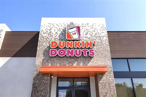 dunkin'donuts sign on the side of a building