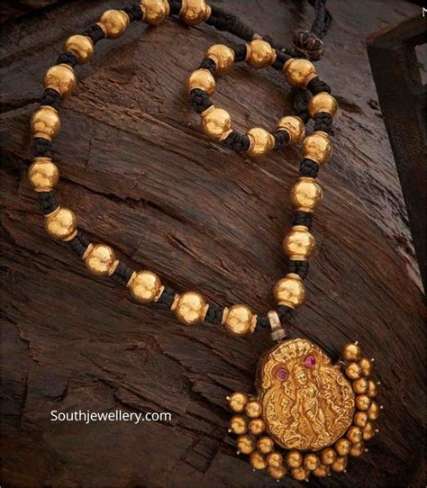 Black thread and gold balls necklace - Indian Jewellery Designs