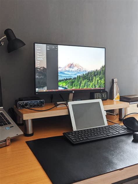 Computer Screen on Wooden Desk · Free Stock Photo