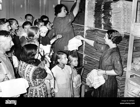 The Nazi propaganda picture shows Volksdeutsche refugees from Poland after arriving in a German ...