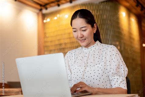 woman work using computer hand typing laptop keyboard contact us ...