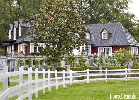 The exterior of a Swedish summer house is painted in traditional Falun ...