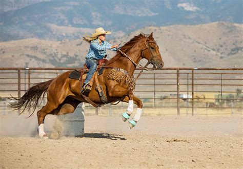 Young Cowgirl Barrel Racing Stock Photo - Download Image Now - iStock