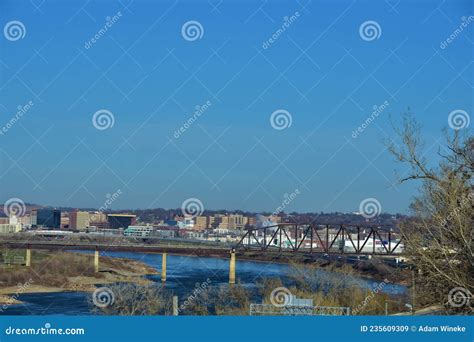 Sioux City Iowa Downtown Buildings Skyline Behind a Rail Bridge Along the Canal Stock Image ...